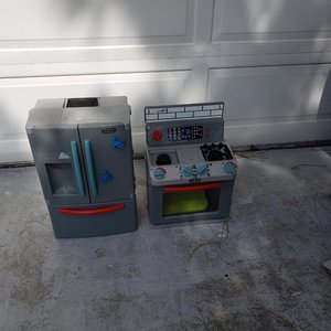 Photo of free Childs refrigerator and stove (Clearwater, Keene and Druid Rd)