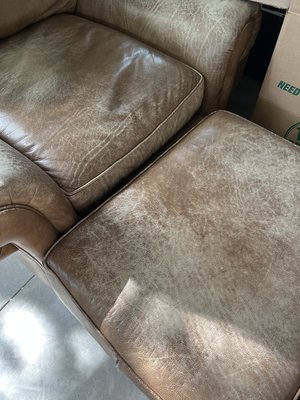 Photo of free Leather chair and ottoman (Near VA hospital)