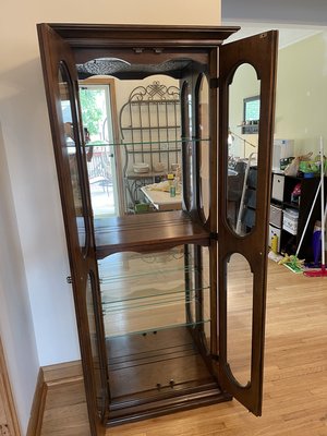 Photo of free Lighted curio cabinet (South Minneapolis)