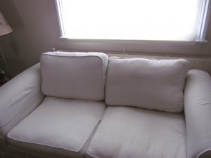 Photo of free two matching cream sofas. (West Brompton SW10)