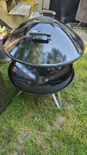 Photo of free basic metal fire pit w/lid (West Asheville)