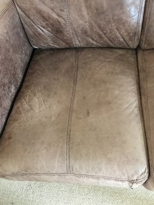 Photo of free Two seater brown leather sofa (Murthly, Perthshire PH1)