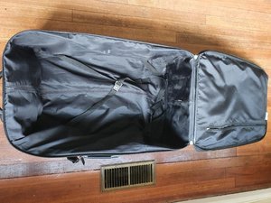 Photo of free Large black suitcase (Coulsdon South CR5)