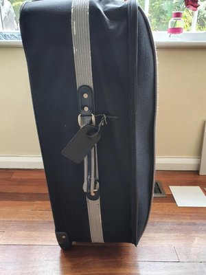 Photo of free Large black suitcase (Coulsdon South CR5)
