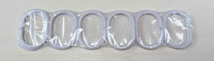 Photo of free 12 shower curtain hooks (Islington N1) #1