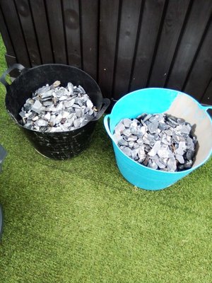 Photo of free 2 tubs of grey slate (Short post code)