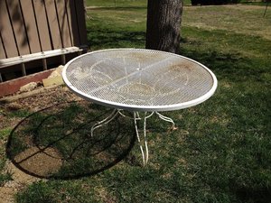 Photo of free Metal patio table (Near munipal golf course)