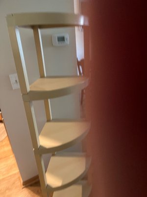 Photo of free Resin corner shelving unit (Near Busse and Golf)