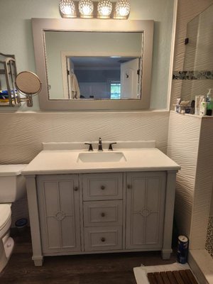 Photo of free Bathroom vanity and mirror (Melbourne Beach)