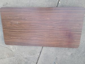 Photo of free 2x wood finish folding tables (near downtown Littleton)