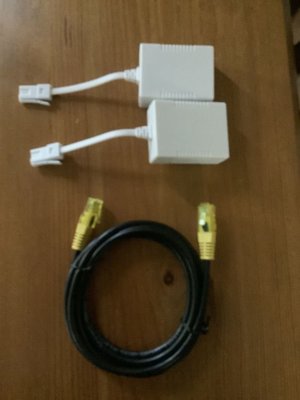 Photo of free 2 x ADSL filters and a modem cable. (Cherry Orchard SY2)