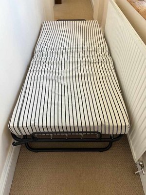 Photo of free Folding bed with mattress (Pontfaen/Forge SY20)