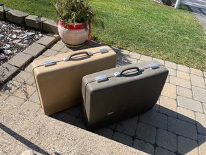 Photo of free 2 hard suitcases (middletown)