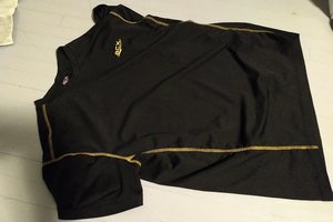 Photo of free Size medium black athletic shirt (Weber/Wellington)