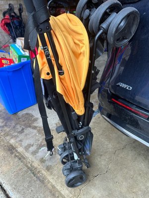 Photo of free Yellow travel stroller (Potomac)