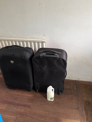 Photo of free 2 largish tatty suitcases (Wheathampstead AL4)