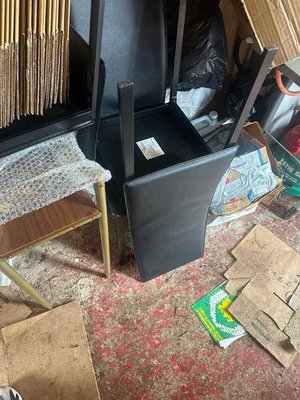 Photo of free Black glass topped table and four chairs. (Totteridge HP13)