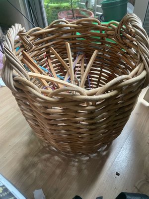Photo of free Cane basket with coat hangers (Fitzgibbon)