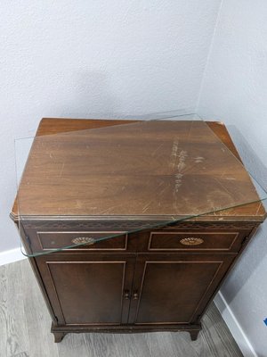 Photo of free Wood cabinet with glass top (Hampden South)