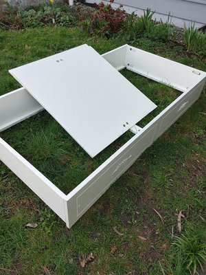 Photo of free Solid white twin bedframe (James Bay)