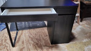 Photo of free Black Ikea desk (Suwanee/Sugar Hill-Suwanee Dam)