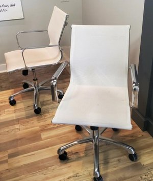 Photo of free 12 white swivel chairs (Downtown Hinsdale)
