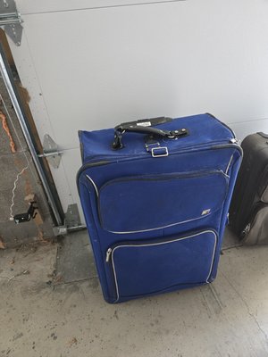 Photo of free Large Rolling Suitcase (Marshall Rd)