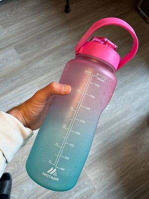 Photo of free 1 2lt pink/blue plastic water bottle 1 glass lemon squeezer (Ravenscourt Park W6)