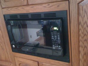 Photo of free GE Microwave and Trim Kit (near downtown Littleton)