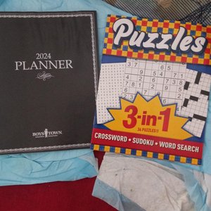 Photo of free 2024 desk planner and puzzle book (Bronx.morrisania 10456)