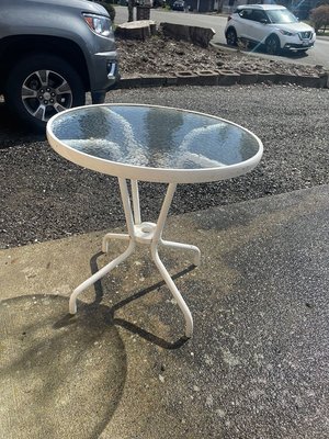 Photo of free Glass top patio table (Bothell/mill creek)