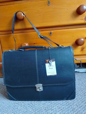 Photo of free Black briefcase, leatherette (Starkholmes DE4)