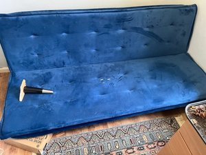 Photo of free Blue velvet sofa bed, broken leg. (BT6)