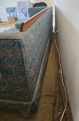 Photo of free Sturdy Couch with Wood Trim (Near STL Galleria)