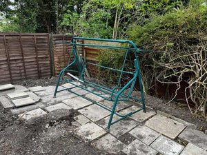 Photo of free Garden swing seat. Needs cushions but otherwise in good cond (Wheathampstead AL4)