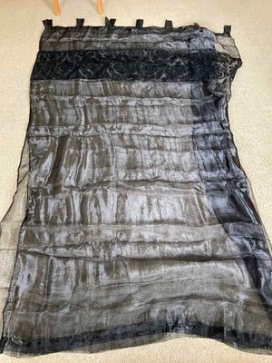 Photo of free Black voile tab top curtains (pair). (Leckhampton GL53)