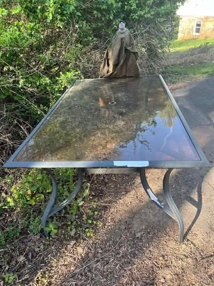 Photo of free Outdoor Glass table (Beulah rd and Druid hill rd NE) #2