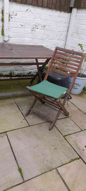 Photo of free Wooden folding garden table and 6 chairs. (Wallasey CH45)