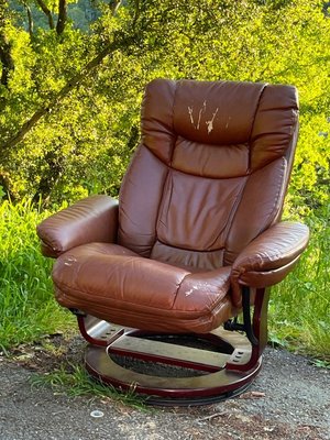 Photo of free Worn Used leather chair on curbside (76 Martens Blvd, San Rafael)