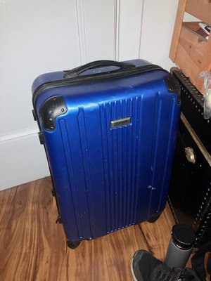 Photo of free Large Blue Suitcase (Takoma, DC)
