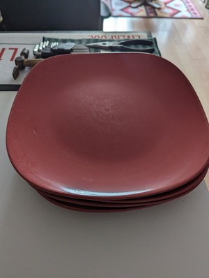 Photo of free 4 Red dinner plates (Lewisham)