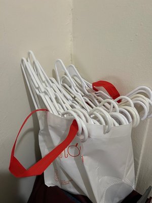 Photo of free Hangers - white, plastic (Hell's Kitchen 9th Ave @ 49th)