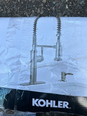 Photo of free New black Kohler kitchen faucet (NE Seattle)