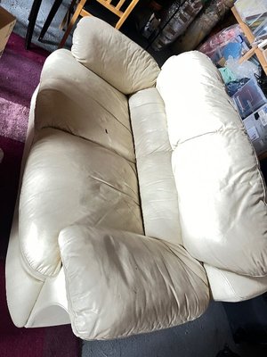 Photo of free 2 seater leather sofa ( small hole in 1 area - see photo) (Lexden CO3)