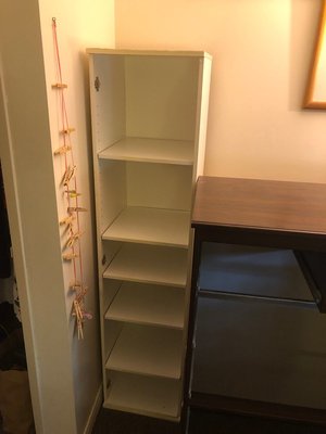 Photo of free Tall skinny white bookshelf (Collegeway/Mississauga Road)