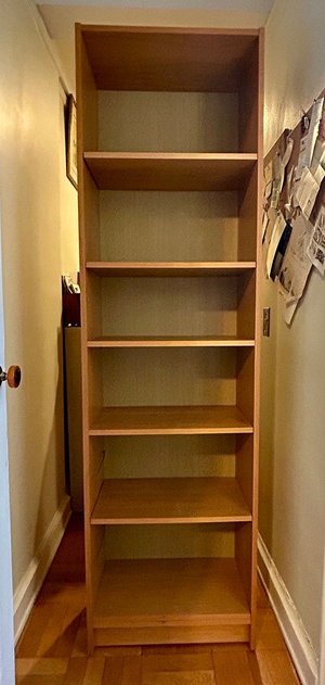 Photo of free Tall Wood Bookcase (Washington Heights)