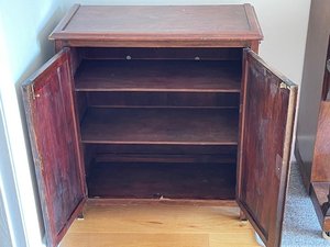 Photo of free Darkwood Storage Cupboard (NW Chichester)