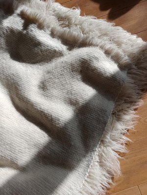 Photo of free Large white Flokati wool rug (Newington Green N16)