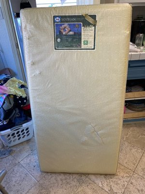 Photo of free extra crib mattress (South San Francisco)