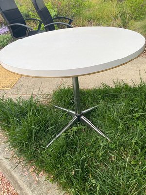 Photo of free Round white table with metal base (Montgomery Hills)